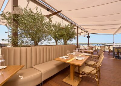 Fanco restaurant terrace with upholstered bench